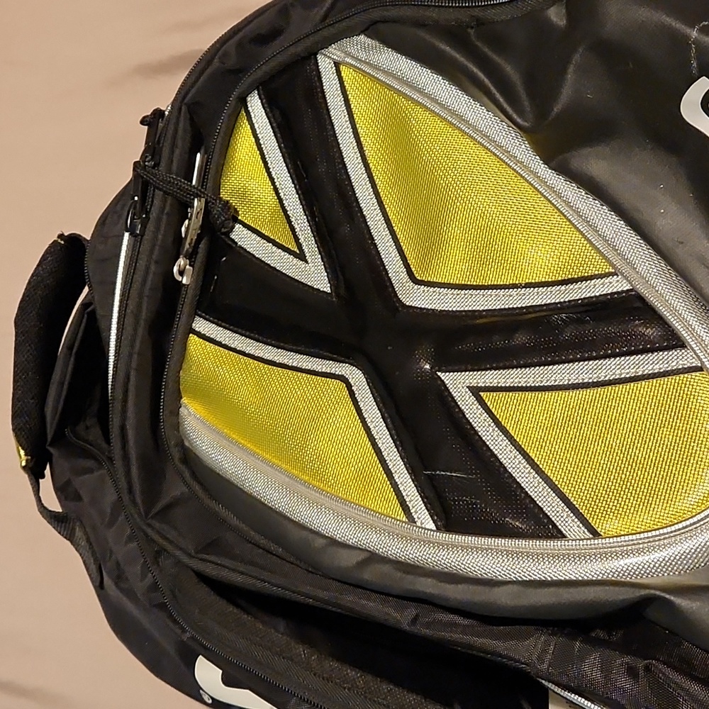 Yellow and black head back pack